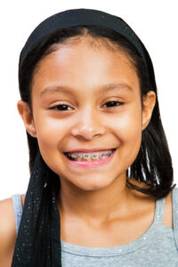 smiling girl with braces