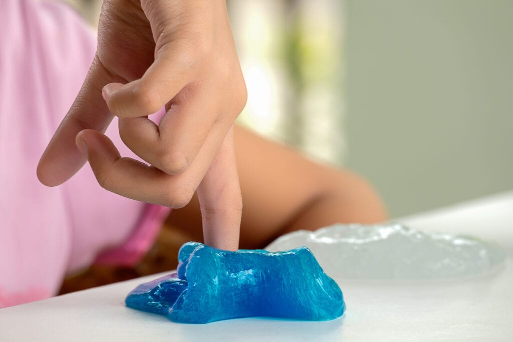 Kid playing with orthodontic wax